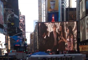 Damian Nixey, Marc Petzke, Shailla Quadra and Yolandi Franken, still image of "Brad Fitt Will Be Mine" showing in the heart of Times Square at the New York City International Film Festival.